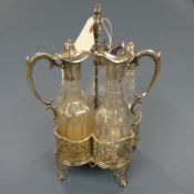 A fine quality silver five bottle cruet set and stand, London, 1811, H.26cm