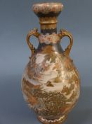 A fine quality Meiji period Satsuma baluster vase finely decorated with Samura in a mountain setting