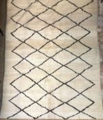A genuine Moroccan Berber (Beni Ourain) the all over lozenge design on a ivory ground 330cm x 195cm