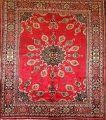 An extremely fine signed Meshad carpet 297cm x 200cm, central pole medallion with repeating pearl