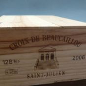 An unopened crate of Croix de Beacaillou 2006 Saint-Julien wine 33cm x 50cm x 19cm