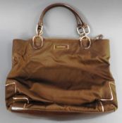 A collection of four designer vintage handbags to include a Cartier red leather cross body