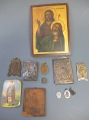 A late 19th Century Russian handpainted religious icon on board, 26cm x 19cm, along with a