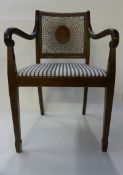 A harlequin set of eight Regency design mahogany cane panelled dining chairs, the blue striped