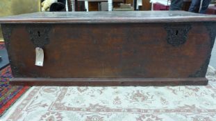 An 18th/19th Century colonial hardwood chest of large size embellished with wrought iron mounts