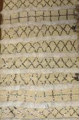 A vintage Moroccan throw (wedding blanket, Handira) handmade by artisans in the Atlas mountains