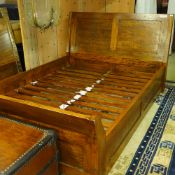 A contemporary teak Santa Fe double bed, by Barker and Stonehouse 166cm x 101cm x 210cm