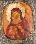 A 19th Century gilt metal Oklad mother and child 30cm x 24cm