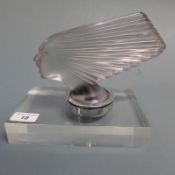 A Rene Lalique satin glass victoire car mascot, slight chipping in original chrome mount, 13cm x