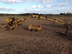 Rear mounted hedgecutter with flail and saw attachments