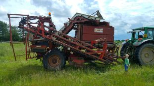 Simon 2 Row Top Lifting harvester. Location Lakenheath, Suffolk.