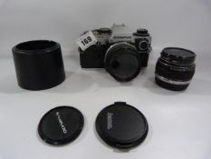 Olympus OM10 Camera Body with 2 x 50mm Lenses