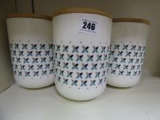 *3 Storage Jars with Wood Tops