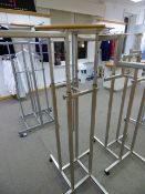 *Brushed Stainless Steel Swastika Style Garment Rail with Wood Plinth