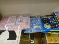*Shelf Containing Assorted Peppa Pig Projector Torches etc