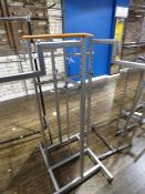 *Silver Swastika Style Garment Rail with Wood Plinth