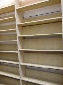 *5 Wall Mounted Beech Bookshelves and one Double Sided Gondola Unit