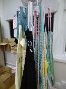 *Display Stand containing Assorted Aprons - Oven Gloves and Tea Cloths