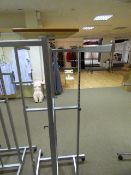 *Silver Swastika Style Garment Rail with Wood Plinth