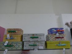 *4 Sets of Graduated Vanity Cases