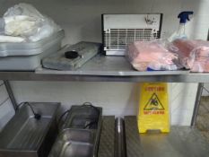 *Contents of the Shelving Unit Including Cleaning Cloths, Insectocutor, Bain Marie Inserts,
