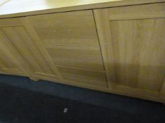 *Sideboard Unit enclosed by Double Doors with 3 Drawers in Light Wood Finish and Brushed Stainless