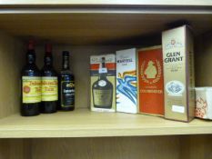 3 Bottles of Rum and 4 Bottles of Cognac