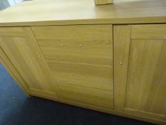 *Sideboard Unit enclosed by Double Doors with 3 Drawers in Light Wood Finish and Brushed Stainless