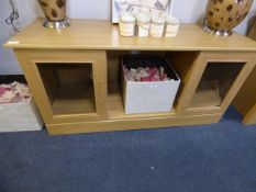 *MEDIA UNIT ENCLOSED BY DOUBLE GLASS DOORS IN WHITE OAK FINISH