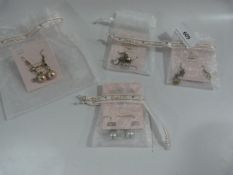*4 Pairs of Earrings