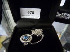 Necklace with Cartwheel Pendant set with Blue Stone