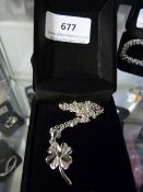 Necklace with Flower Pendant set with Green Stone