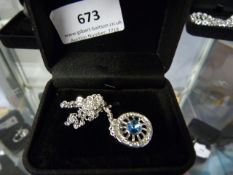 Necklace with Cartwheel Blue Set Stone Pendant