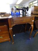 Singer Sewing Machine on Walnut Base