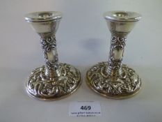 A Pair of Silver Patterned Candle Sticks
