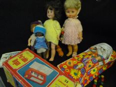 Box containing Various Dolls