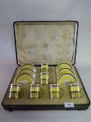 A Boxed Coffee Set With Silver Mounts