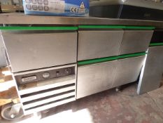 Refrigerated Preparation Counter Enclosed by Double Doors and Drawers