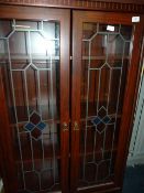 Simulated Mahogany Bookcase enclosed by Double Doors