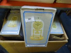 *Box containing Brass Mantle Clocks under Domes