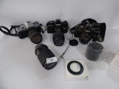3 Minolta Cameras - 4 Lenses etc