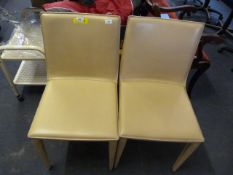 2 Cream Leather Chairs