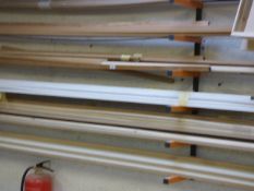 *Wall Mounted Rack Containing Assorted Soft and Hardwood Beading etc