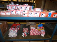 *2 Shelves containing MK Grid & Grid Plus Switches and Accessories