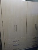 Pair of 2 Door Wardrobes over 3 Drawers in Light Beech Finish with Brushed Stainless Steel Handles