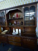 Mahogany Wall Unit on Turned Legs enclosed by Glazed Doors