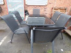 Black Glass and Tubular Steel Outdoor Dining Table with 6 Stackable Chairs