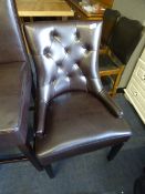 *Brown Leather Upholstered Chair with Button Back