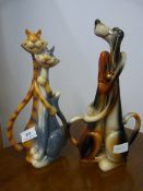 Pair of Comical Figurines