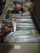 Box containing Stick on Wigs and other Novelty Items